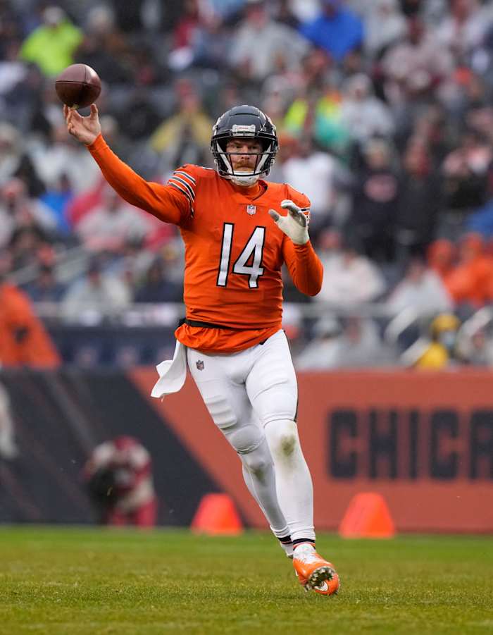 Dec 5, 2021; Chicago, Illinois, USA; Chicago Bears quarterback Andy Dalton (14) makes a pass against the Arizona Cardinals during the second half at Soldier Field. Mandatory Credit: Mike Dinovo-USA TODAY Sports